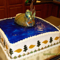 Duck Hunter Marble cake frosted with buttercream icing. side decorations are fondant and the duck and cattails are fondant also. I decided to add a...
