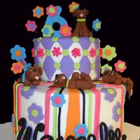 Girlie Puppy Cake My daughter wanted a girlie cake but also wanted to include a puppy theme since she was asking for pet food for the local animal shelter...