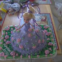 Princess Cake This is a homemade yellow cake with homemade buttercream icing. It was done for a girl I babysit for her 8th birthday. This is the first...