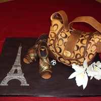 Coach Purse For Alex This cake is Macsmom's wonderful Tuxedo cake flavor (layered white and vanilla cake with white and milk chocolate truffle filling). It...
