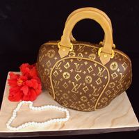 Louis Vitton Shell Purse This is a Very Vanilla cake with alternating colors of Hot Pink and White inside. The theme of the Bridal Shower is Sex in the City....