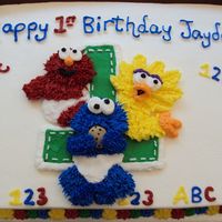 Sesame Street 1St Birthday This was for a friends son. Got many ideas from CC and web to make a simple sheet cake. Also inpictures is the Smash Cake TFL.