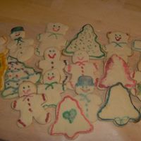 Christmas Cookies I made these with the traditional sugar cookie recipe. I cut them out and then painted on them with food coloring.