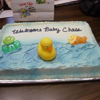 Rubber Ducky Cake I have made this cake for several showers. Everyone seems to like this design. Buttercream icing and spay used for blue color. Toys are...