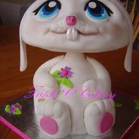 Littlest Pet Shop Bunny 3-D bunny made from the WIlton wondermold pan and a 10" and 6" oval for the head. Iced with traditional buttercream and covered...