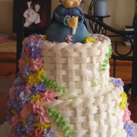 Magical Moment--A Motherly Touch Red velvet cake with b/c, fairly godmother is made out of fondant.