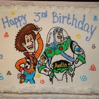 Woody And Buzz Piping gel was used to trace the outline onto the cake and then designed w/buttercream icing