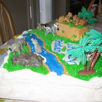 Safari Cake Buttercream icing - all animals, except for alligator, are plastic.