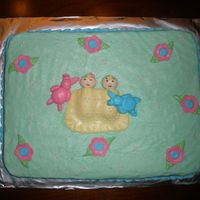 Twin Boy And Girl Shower Cake This was for a great friend who had twins. The babies were done in MMF. Very fun to make! Thanks Cake Central for the wonderful idea!