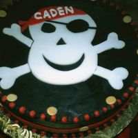 Pirate Party This is iced in chocolate buttercream with fondant accents.