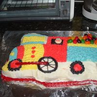 Train Cake I used the Wilton train pan mold, and followed one of the design patterns. But because I was short on time, I filled the train with jelly...