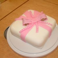 Wilton 3, Cake 1 I absolutely loved working with the fondant. This was made with the Wilton premade stuff, but the MMF is wonderful, and actually tastes...