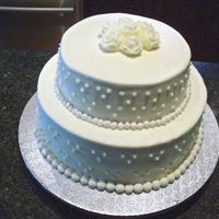 My First Official Wedding Cake This was a lot of fun to do... my first official wedding cake. Chocolate fudge cake with BC.