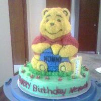 Pooh This is my first actually decorated cake! I am very proud of it. It was for a little girls first birthday. The parents were very pleased.