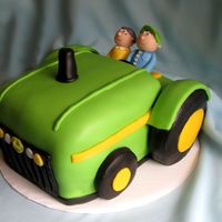 John Deere Cake White Almond Sour Cream cake with vanilla buttercream and fondant. Gumpaste figures.