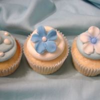 Tea Party Cupcakes These cupcakes were for a tea party photo shoot with 3 adorable little girls. WASC cupcakes with vanilla buttercream and fondant flowers...