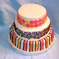 Wedding Cake 10", 8" and 6" chocolate cakes with espresso ganache and cream cheese buttercream. Fondant decorations and freehand piping (...