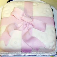 Wilton Course 3 Package Cake This is my first fondant cake! I just love working with it. I like a more simple looking cake, so I did a little less than the book.