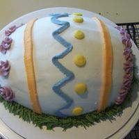 Easter Egg Cake First attempt at an egg shaped cake, it was for a cake walk at a navy base event for families who are being deployed soon. I loved doing...