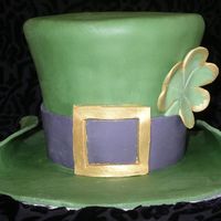 St. Patrick's Hat First time trying to make a hat. I had a lot of fun with the cake. 3 layers of 6" round carved into hat shape. Pound cake with lemon...