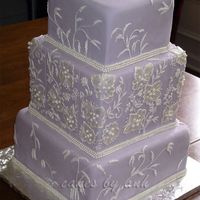 Brush Embroidery Cake This design was inspired by the embroidery on the bride's dress. Edible triple pearl strings border to match her dress as well. I had...