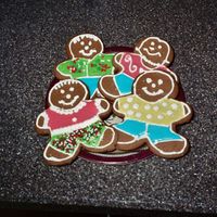 Gingerbread Men First time I've done cookie decorating with royal. Tried to do a run in technique, but this was the month before I started my first...