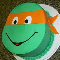 Ninja Turtle I cut the shape out and used whipped icing and fondant accents.