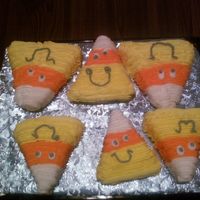 Happy Halloween: Candy Corn Candy Corn cut outs, decorated using butter cream icing. Inspired by picture in Cake decorating magazine