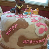 100_0731.jpg Kitty/Doggy cake for a 13th birthday. All fondant (except lettering). Top says "bow-wow meow-look who's 13 now"