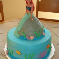 Little Mermaid I made this cake for my daughter's birthday. It was inspired by the one posted by CustomCakesbySharon. Ariel is sitting on a...