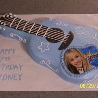 Hannan Montanna Cake This is not a great picture but it is a simple cake for the Hannah star. All bc except for he Hannah picture.