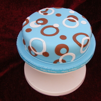 Retro Circles Cake made for my Father In Law's Birthday. Didn't have time to go all out on it but I'm pleased with the simplicity of it.