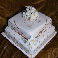 Ribbons, Hearts And Flowers Phew, this was a challenge! I'm just starting up a new business and this is my very first wedding cake. No pressure, only two weeks...