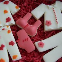 P.j Party Hand-shaped cookies; covered and decorated with chocolate fondant.