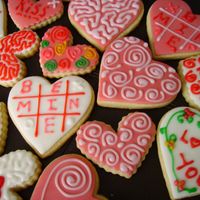 Valentine's Cookies Just in time for V-Day. Buttery cookies covered with chocolate fondant and decorated with fondant icing.