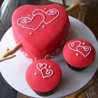 Red Heart Cake This is my sample cake for my customer. The cake is white chocolate butter cake with raspberry buttercream filling and the cupcakes are...