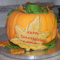 Thanksgiving Pumpkin Cake Pumpkin Cake with chocolate fondant and decorated butter cookie.