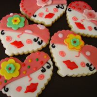 Sassie Girls These are decorative cookies I made for customer on Valentine's day. Butter vanilla-orange cookie covered with chocolate fondant and...