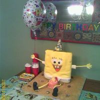 Spongebob Made this cake for my son who was turning 5. Big spongebob fan! Made with Pound Cake covered in fondant chocolate shells.