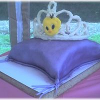 Tweet_Tiara3.jpg Chocolate tiara and choc. fudge pillow cake covered in fondant. Tiara and pillow cake both firsts. Not too thrilled with how either turned...