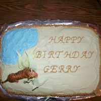 Savanah Cake This cake was a birthday cake for a big Tiger fan. I tried to for a savanah feel. The whole cake is covered in butter cream. Blue for the...