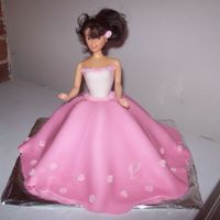 Daughters Third Birthday Princess Cake. This is the princess in pink, cake made for my daughters third birthday. I have twins and each girl got to pick the colour of dress their...