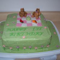 Teddy Bears Picnic Cake We had a teddy bears picnic theme for my daughters first birthday, this was her cake. THe cake was french vanilla with BC icing. Figures...