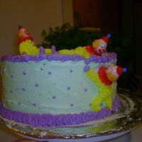 Second Cake Assigned In The First Wilton Course. This is my "clown cake" we were supposed to make and decorate a cake and then pipe some clowns on it. I thought a bunch of clowns...