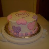 Wilton Course One, First Cake. This was the first cake I did for the Wilton cake decorating course one. It was iced with the class buttercream icing and the hearts were...