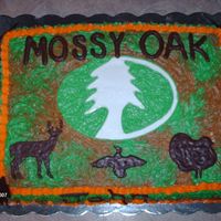 Mossy Oak Cake This is an 11x15 buttercream cake. The letters and the animals are made out of chocolate. I made this cake for a little boys 9th birthday...