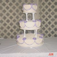 Wedding Cake This is the first wedding cake I did, and I will never do a red velvet cake again. I had so much trouble getting the red covered. I did...