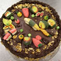 Marzipan Sushi Marzipan sushi. The cake is pund with chocolate fudge icing.