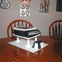 Piano Cake This is my first attempt at a piano cake. White cake with bc frosting.