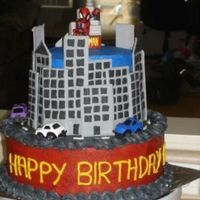 Spider-Man Cake This was a really fun cake to make. Bottom layer is 10" and top is 6". Both cakes are chocolate with a chocolate mousse iced with...